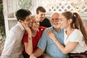 veteran with his family gathered around